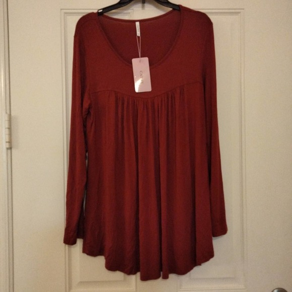 Cathy Tops - Rayon blend maroon long top Crew neck.